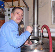 tony practicing with brewing kettle